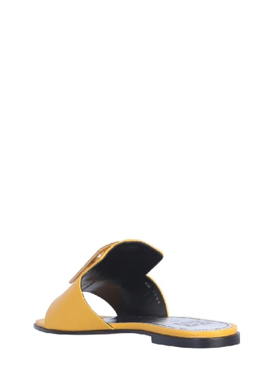 Shop Givenchy 4g Logo Buckle Slides In Yellow