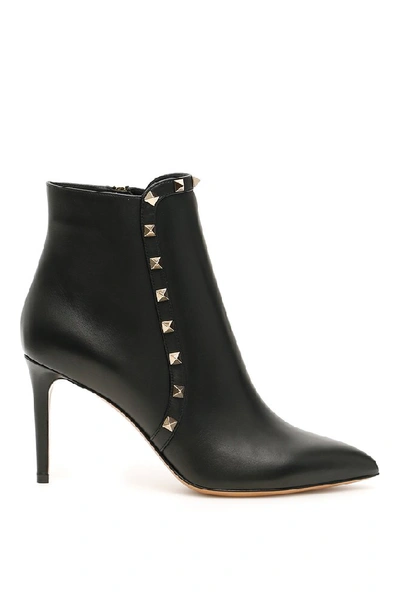 Shop Valentino Garavani Rockstud Pointed Toe Ankle Boots In Black