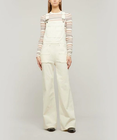 Shop Frame Carpenter Dungarees In Off White