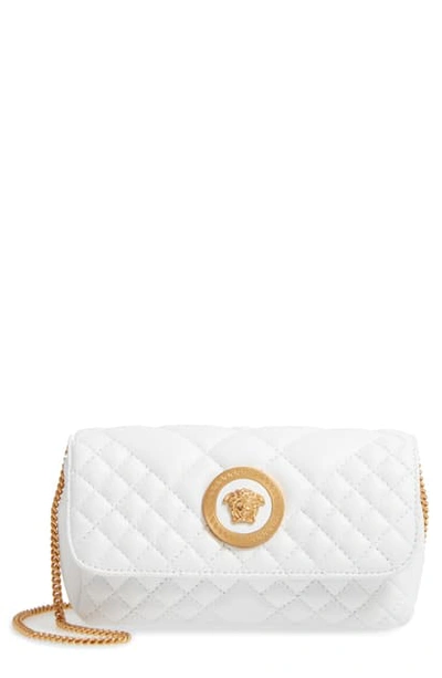 Shop Versace Small Tribute Small Quilted Crossbody Bag In Optical White/ Tribute Gold