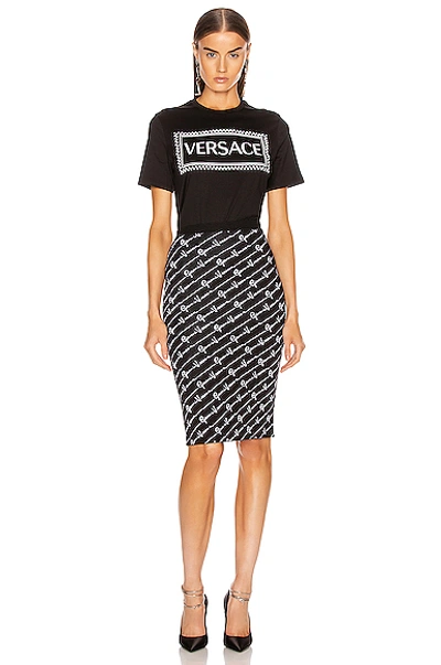 Shop Versace Text Print Skirt In Black & White