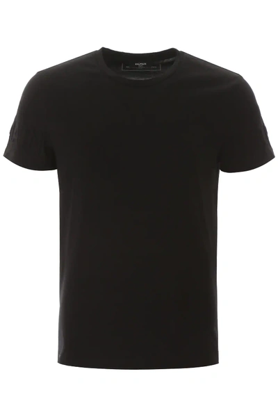 Shop Balmain T-shirt With Embossed Logo In Black