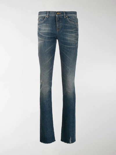 Shop Saint Laurent Low-rise Slim-fit Jeans In Blue
