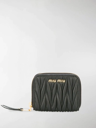 Shop Miu Miu Lettering Logo Zipped Purse In Black