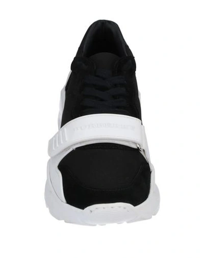 Shop Burberry Sneakers In Black