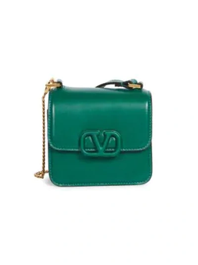 Shop Valentino Micro Vsling Leather Crossbody Bag In Green