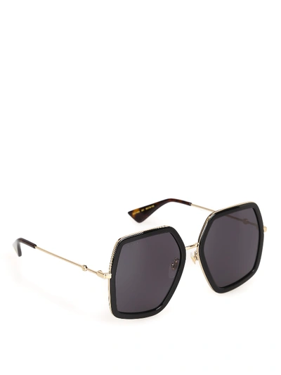 Shop Gucci Gg0106s Sunglasses In Black Gold Grey