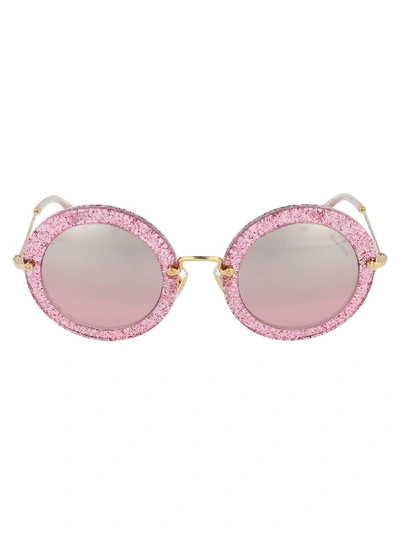 Shop Miu Miu Sunglasses In Glitter Pink