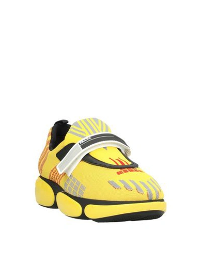 Shop Prada Sneakers In Yellow