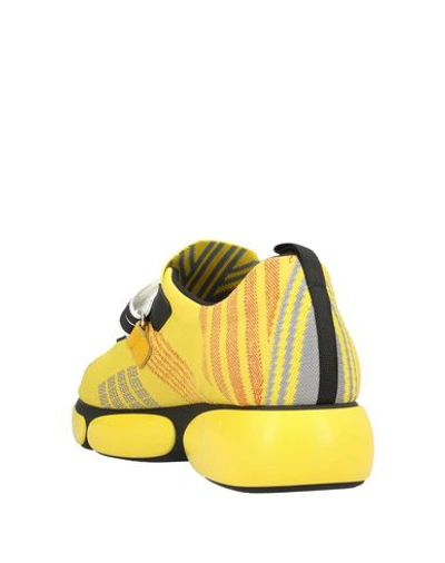 Shop Prada Sneakers In Yellow