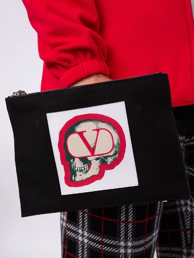 Shop Valentino Garavani X Undercover Skull Pouch