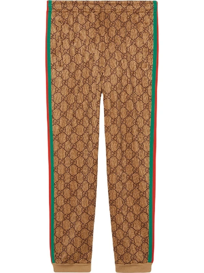 Shop Gucci Gg Supreme Print Cotton Blend Sweat Pants In Brown