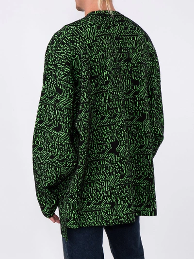 Shop Balenciaga Green Slogan Print Sweater
