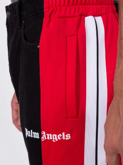 Shop Palm Angels Bootcut Track Denim Jeans Black-red