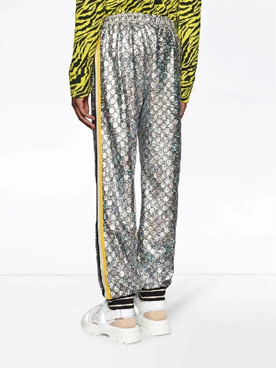 Shop Gucci Holographic Gg Jersey Pants In Silver