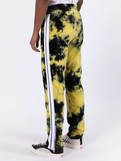 Shop Palm Angels Tie-dye Track Pants Yellow