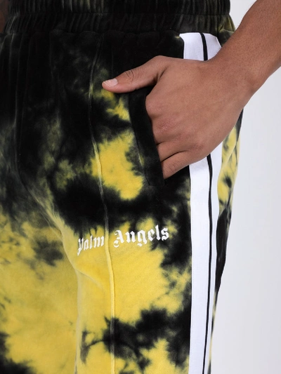 Shop Palm Angels Tie-dye Track Pants Yellow