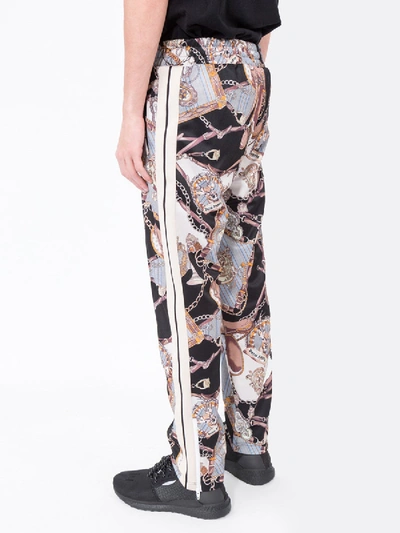 Shop Palm Angels Dark Bridle Track Pants