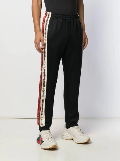 Shop Gucci Printed Side Stripe Track Pants In Black