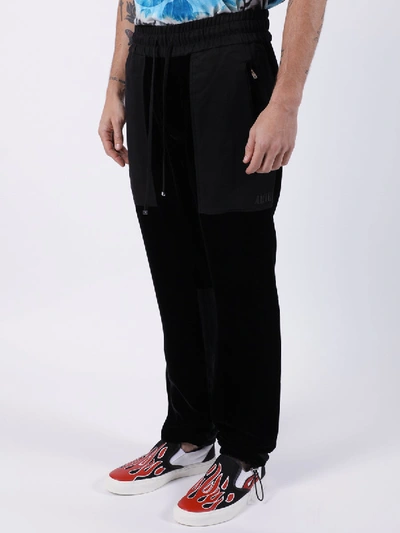 Shop Amiri Velvet Commando Sweatpants Black