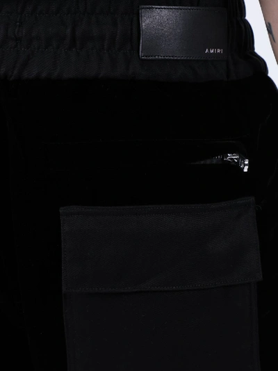 Shop Amiri Velvet Commando Sweatpants Black