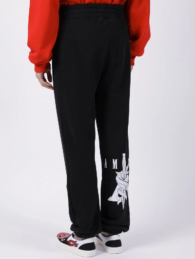 Shop Amiri Heart And Dagger Sweatpants Black