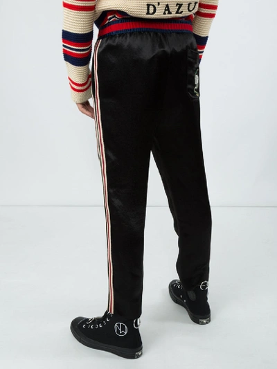 Shop Gucci Embroidered Jogging Pants In Black