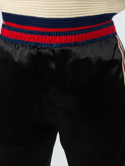 Shop Gucci Embroidered Jogging Pants In Black