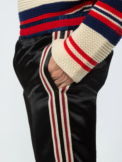 Shop Gucci Embroidered Jogging Pants In Black