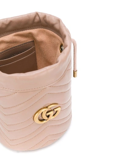 Shop Gucci Mini Gg Marmont Bucket Bag In Neutral