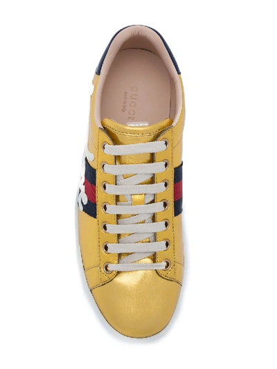 Shop Gucci Ace Sneakers In Gold