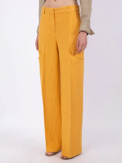 Shop Jacquemus Le Pantalon Moyo Trousers Orange