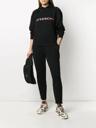 Shop Givenchy Embroidered Logo Track Pants In Black