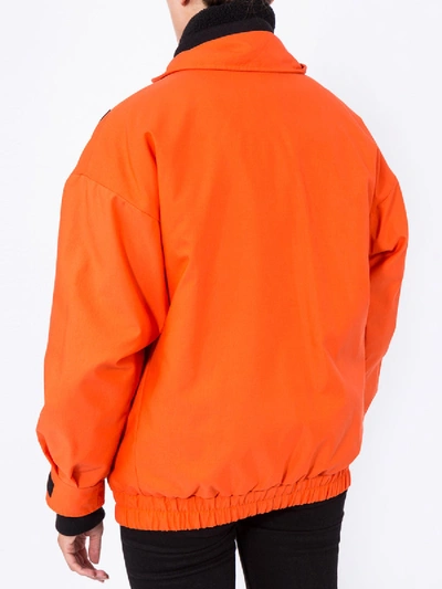 Shop Burberry Orange Contrast X Detail Jacket