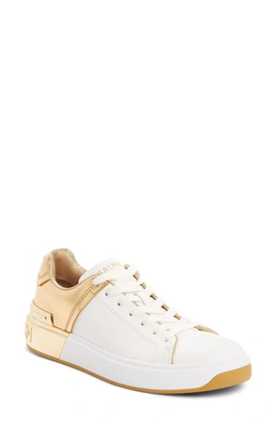 Shop Balmain B-court Metallic Accent Sneaker In White/ Gold
