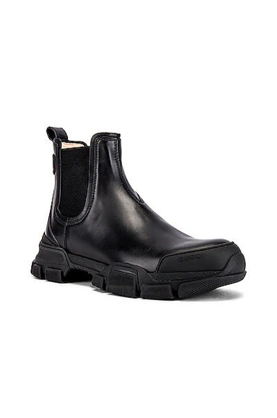 Shop Gucci Leon Chelsea Boot In Black & Black