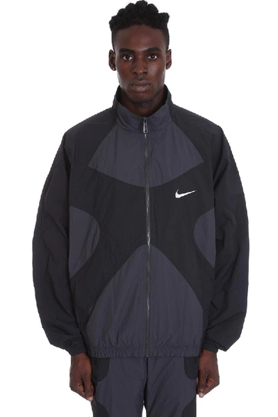 Shop Nike Re Issue Jkt Casual Jacket In Black Tech/synthetic