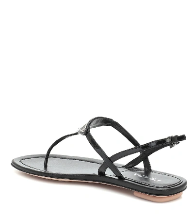 Shop Prada Patent Leather Thong Sandals In Black