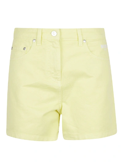 Shop Msgm Denim Shorts In Lime