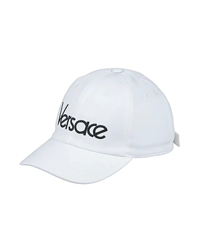 Shop Versace Hats In White