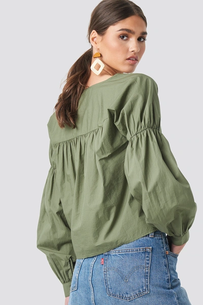 Shop Na-kd Large Sleeve V-neck Cotton Blouse Green In Khaki