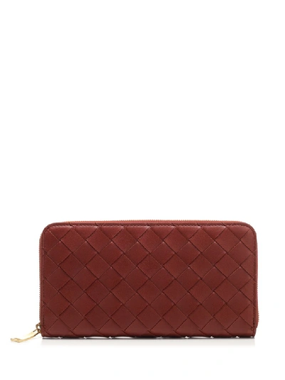 Shop Bottega Veneta Zipped Intrecciato Wallet In Red