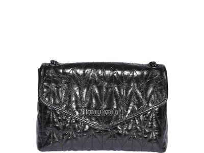 Shop Miu Miu Matelassé Shoulder Bag In Black