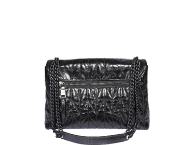 Shop Miu Miu Matelassé Shoulder Bag In Black