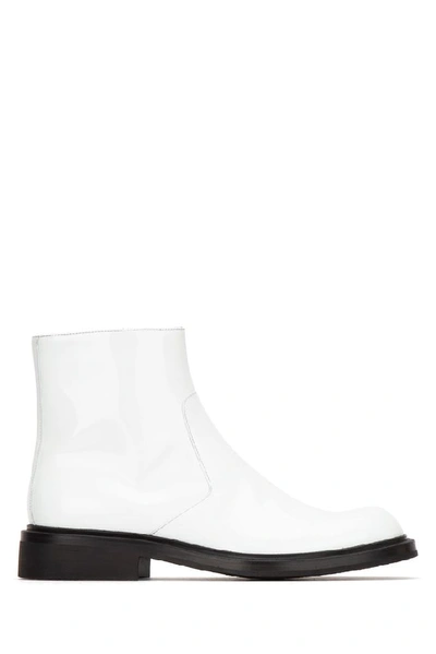 Shop Prada Round Toe Zipped Ankle Boots In White