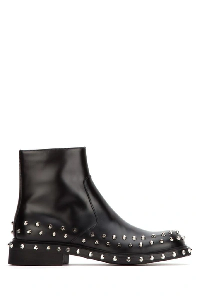 Shop Prada Studded Ankle Boots In Black