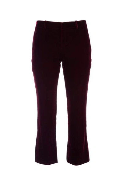 Shop Saint Laurent Velvet Cropped Pants In Red