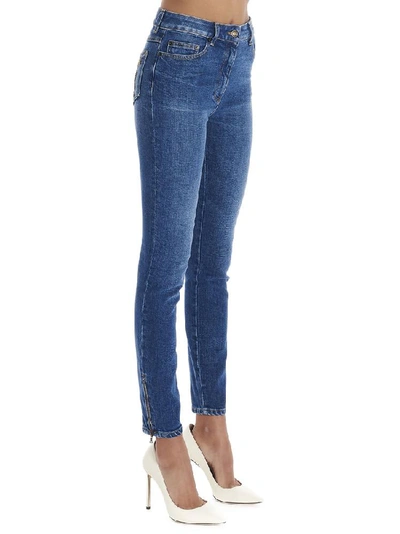 Shop Moschino Teddy Embellished Skinny Jeans In Blue