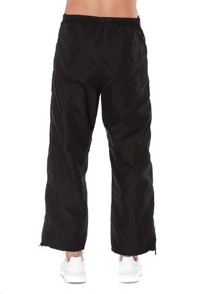 Shop Givenchy Zip Detail Pants In Black