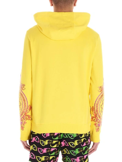 Shop Versace Baroque Motif Printed Hoodie In Yellow